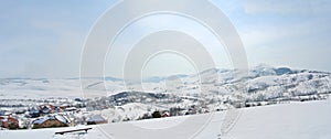 Panorama of idyllic snowy winter landscape in the mountains