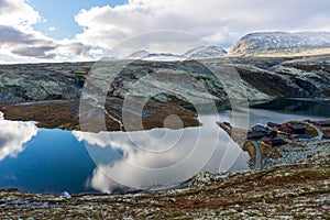 Panorama image of Rondvassbu tourist center in the middle of Rondane national park in Sel, Norway. Rondvatnet lake and ula river