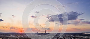 Panorama of an industrial landscape at sunset. thermal power plant at dusk, aerial view