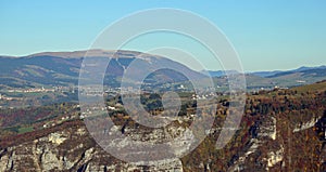 Panorama of the italian mountains with the town of Asiago and th photo