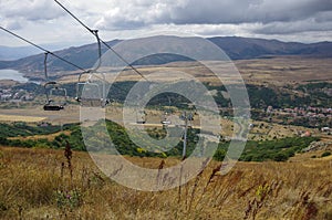 Panorama of Jermuk spa resort city and Arpa river canyon form ropeway station. Armenia. photo