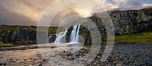 Panorama of Kirkjufellsfoss waterfall in West Iceland