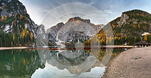 Panorama of Lago di Braies lake and Seekofel peak at sunrise, Dolomites. Italy