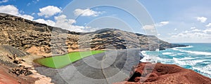 Panorama of Laguna Verde, a green lake near the village of El Golfo in Lanzarote, Canary islands, Spain