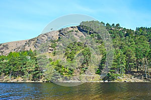 Panorama of Lake Lough Tay or The Guinness Lake. County Wicklow, Wicklow Mountains National Park, Ireland.