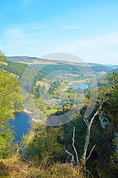 Panorama of Lake Lough Tay or The Guinness Lake. County Wicklow, Wicklow Mountains National Park, Ireland.