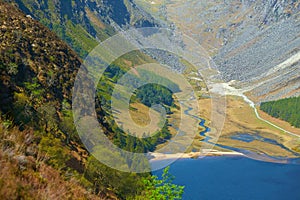 Panorama of Lake Lough Tay or The Guinness Lake. County Wicklow, Wicklow Mountains National Park, Ireland.