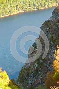 Panorama of Lake Lough Tay or The Guinness Lake. County Wicklow, Wicklow Mountains National Park, Ireland.