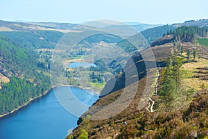 Panorama of Lake Lough Tay or The Guinness Lake. County Wicklow, Wicklow Mountains National Park, Ireland.