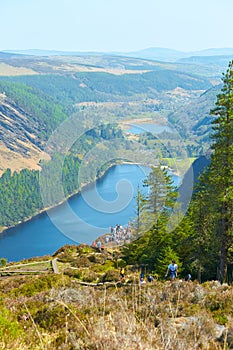 Panorama of Lake Lough Tay or The Guinness Lake. County Wicklow, Wicklow Mountains National Park, Ireland.