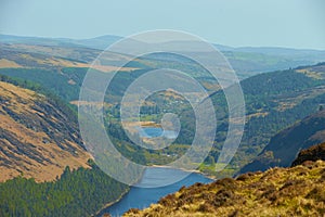 Panorama of Lake Lough Tay or The Guinness Lake. County Wicklow, Wicklow Mountains National Park, Ireland.