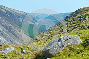 Panorama of Lake Lough Tay or The Guinness Lake. County Wicklow, Wicklow Mountains National Park, Ireland.