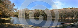 Panorama with lake, sky and trees