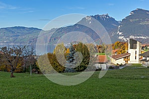 Panorama of Lake Thun and typical Switzerland village near town of Interlaken, canton of Bern