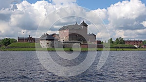 Panorama of lake Vanajavesi with the fortress, cloud by day. Hameenlinna, Finland