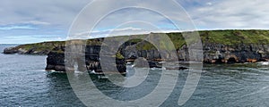 Panorama landscape of the Ballybunion Cliff Walk and rugged cliffs and seashore in County Kerry