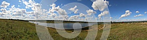 Panorama, landscape city Sergiev Posad, view of the lake and green grass