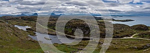 Panorama landscape on the North Coast 500 scenic drive in the Scottish Higlands near Lochniver photo