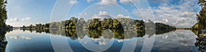 Panorama landscape with river and two bridges.