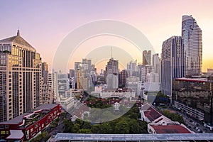 Panorama of landscape with sunset over the building and blue sky at bangkok ,Thailand. View of the tall building in capital with