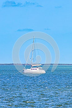 Panorama landscape view Holbox island turquoise water and boats Mexico