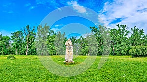Panorama of the lawns of Sofiyivka Park with stone Pagan Slavic Idol, Uman, Ukraine