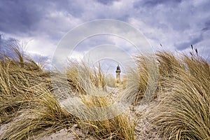 Panorama from the lighthouse in WarnemÃÂ¼nde behind the dune grass photo