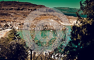 panorama of Lindos bay from Acropolis.yachts are cruising arround