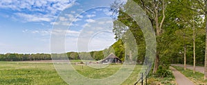 Panorama of a little house at the foot of the Lemelerberg hill in Overijssel