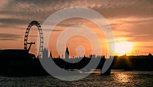 Panorama of London in sunset light. London Eye, Waterloo Bridge, Big Ben, House of Parliament