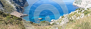 Panorama, lonely bay with sailing ship