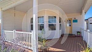 Panorama Long covered wooden entrance porch day light