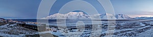 Panorama of Longyearbyen town in the polar night noon