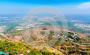 Panorama of Manchi Haveli Village and Champaner historical city from Pavagadh Hill. Gujarat, Western India