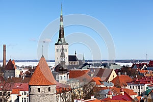 Panorama of medieval Old Town. St Olaf`s spired Baptist church. Beautiful architecture of Vanalinn, subdistrict in district of photo