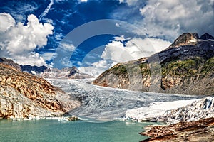 Panorama of melting rhone glacier in swiss alps