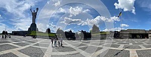 Panorama of the memorial complex with the largest flag of Ukraine and the famous Motherland Monument in Kyiv