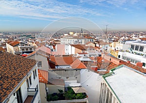 Panorama metropolitan Madrid Spain Europe red tile roof condos offices and Cathedral