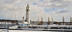 Panorama of the Montreal Clock Tower on a cloudy sky in Montreal the Old Port