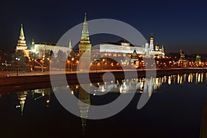 Panorama of the Moscow Kremlin with a mirror image in the Moscow river in the early morning