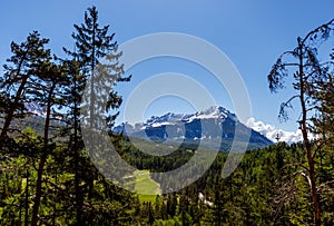 Panorama of Mount Faloria on a sunny day, under a blue sky with no clouds. Cortina d`Ampezzo, Dolomites, Italy photo