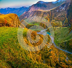 Panorama of a mountain gorge at sunset