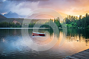 Panorama mountain lake Strbske pleso in National Park High Tatras at sunset, Slovakia