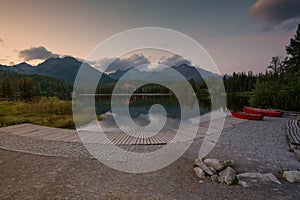 Panorama mountain, lake Strbske Pleso in the Tatry mountains. Summer colors, sunset view