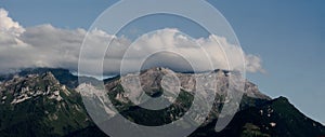 Panorama Of A Mountain Range And Clouds