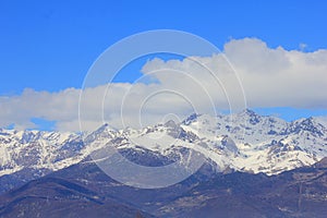 Panorama with mountains and clouds in winter