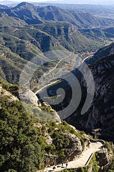 Panorama of mountains and forest stone path in river canyon from