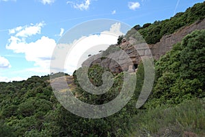 Panorama of the mountains and forests of Bages in Catalonia photographed from La Mola. Catalunya Barcelona. Natural caves