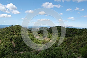 Panorama of the mountains and forests of Bages in Catalonia photographed from the mount of La Mola. View of Montserrat.