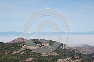 Panorama of the mountains and forests of El Valles in Catalonia photographed from the mount of La Mola next to Montserrat.